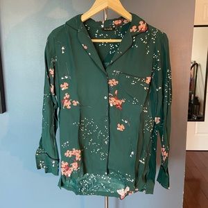 Not sure where it’s from but it is a small blouse that fits true to size